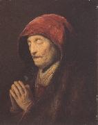 REMBRANDT Harmenszoon van Rijn An old woman at prayer (mk33) oil on canvas